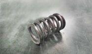 Пружина болта глушителя (приемная труба) 1064000046 Аналог (Китай)